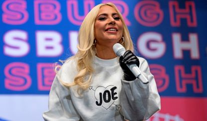 US singer Lady Gaga performs prior to Democratic presidential candidate Joe Biden speaking during a Drive-In Rally at Heinz Field