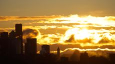 Yellowish sunrise over the Seattle skyline