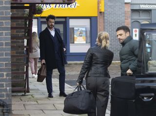 Adam Barlow is annoyed as he sees Sarah Platt unloading Damon Hay's belongings into the flat.