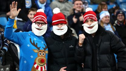 Man City fans get into the Christmas spirit at the Etihad Stadium