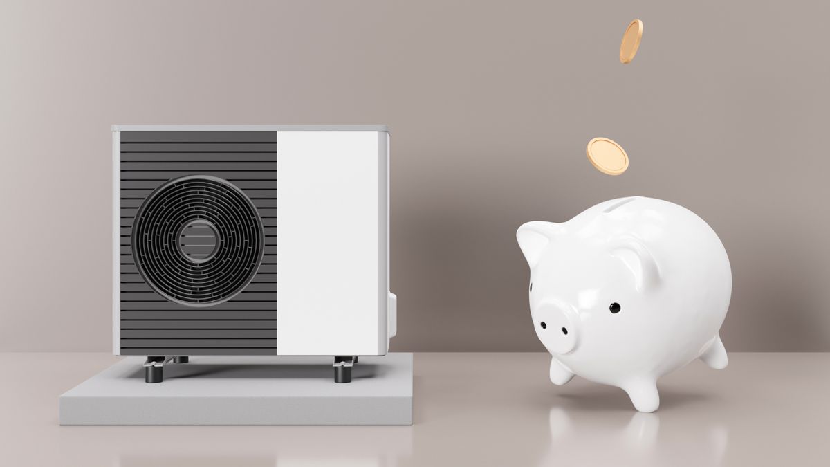 white piggy bank next to model size heat pump