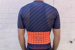 Male cyclist wearing the Santini Eco Sleek Dinamo Short Sleeve Jersey