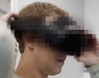 Mark Zuckerberg wearing a blurred VR headset