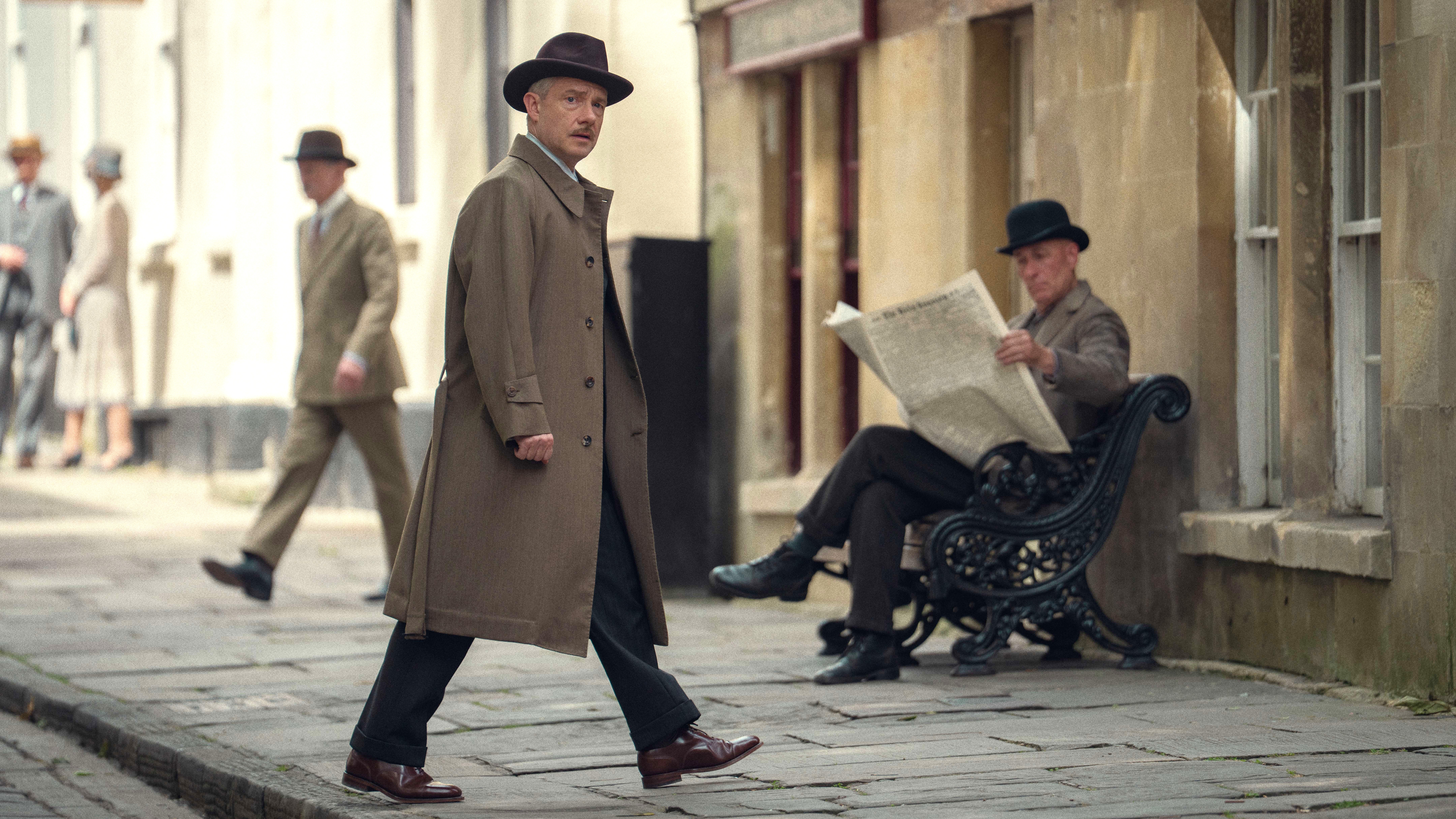 Superintendent Battle (Martin Freeman) walks down the street in a scene from &amp;quot;Agatha Christie's Seven Dials&amp;quot; on Netflix