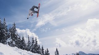 Snowboarder performing flip