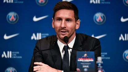 Lionel Messi speaks to the press in Paris 