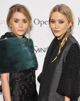 Mary-Kate and Ashley Olsen with differing hairstyles.