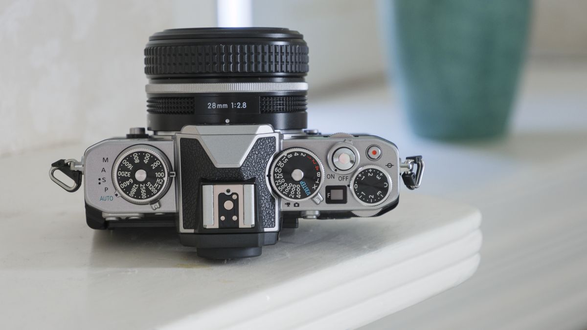 The top of the Nikon Z fc camera on a shelf