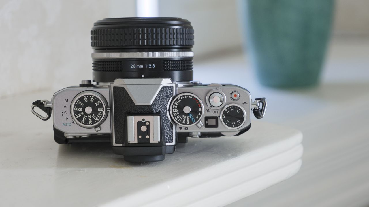 The top of the Nikon Z fc camera on a shelf