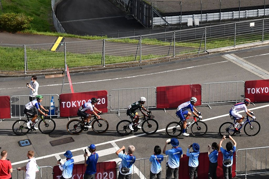 The breakaway group leads the race during the mens cycling road race of the Tokyo 2020 Olympic Games as they enter the Fuji International Speedway in Oyama Japan on July 24 2021 Photo by Jeff PACHOUD AFP Photo by JEFF PACHOUDAFP via Getty Images