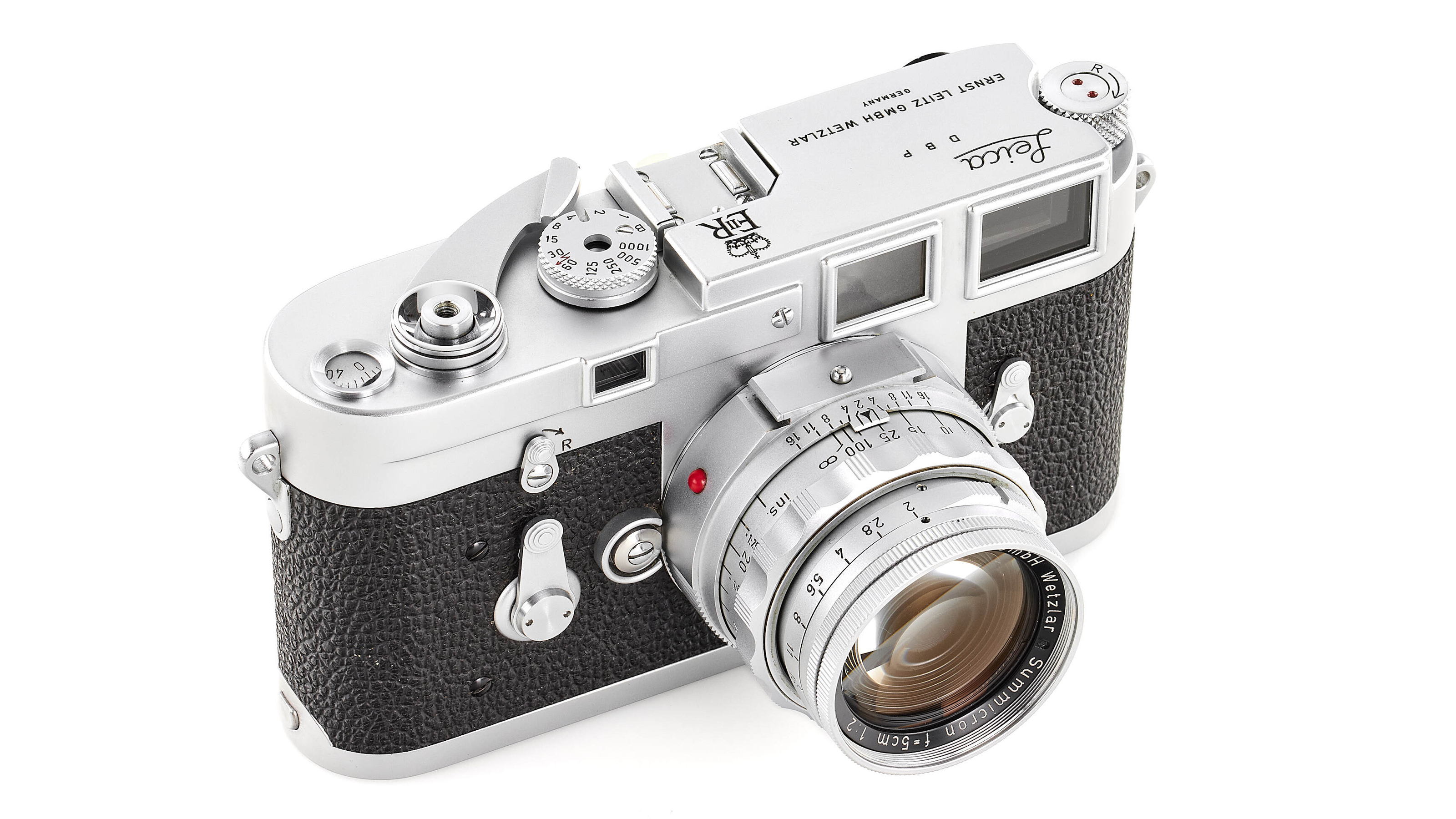 A Leica M3 Queen Elizabeth edition camera on a white background