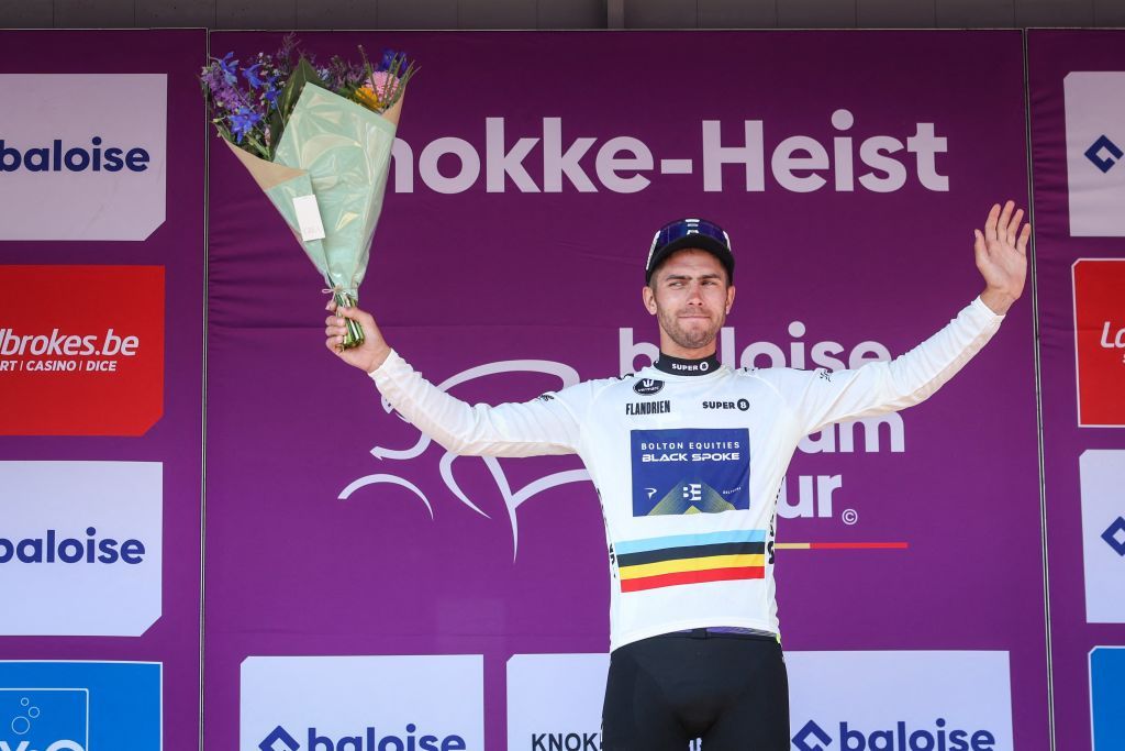 Bolton Equities Black Spokes British rider Jacob Scott celebrates on the podium with the combativitys white jersey after the second stage of the Baloise Belgium Tour cycling race from Merelbeke to KnokkeHeist 1757km on June 15 2023 Photo by DAVID PINTENS Belga AFP Belgium OUT Photo by DAVID PINTENSBelgaAFP via Getty Images