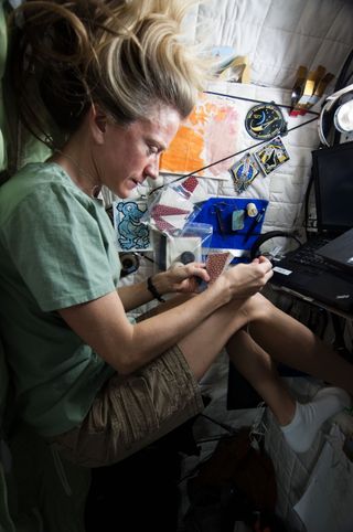 Astronaut Nyberg Sewing