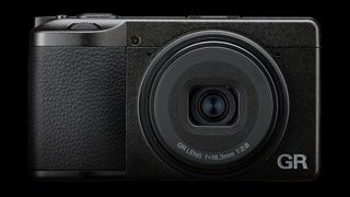 Ricoh GR IV on a black background