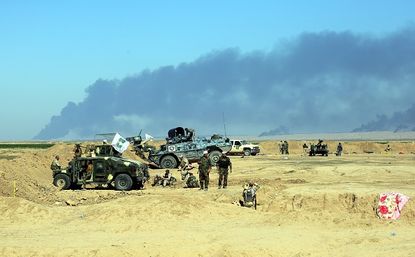 ISIS is burning oilfields to slow an Iraqi attack on Tikrit