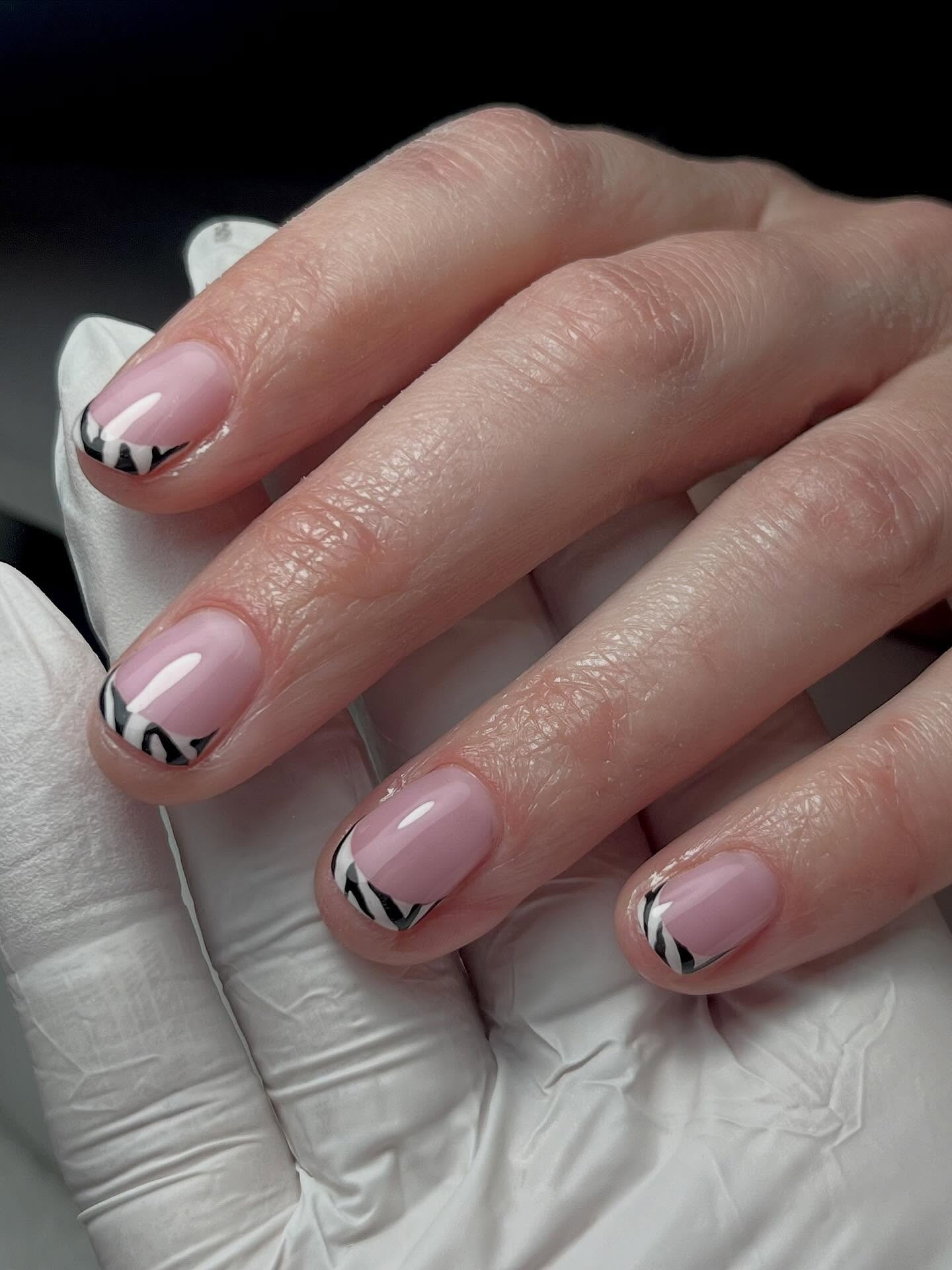 Zebra French manicure.
