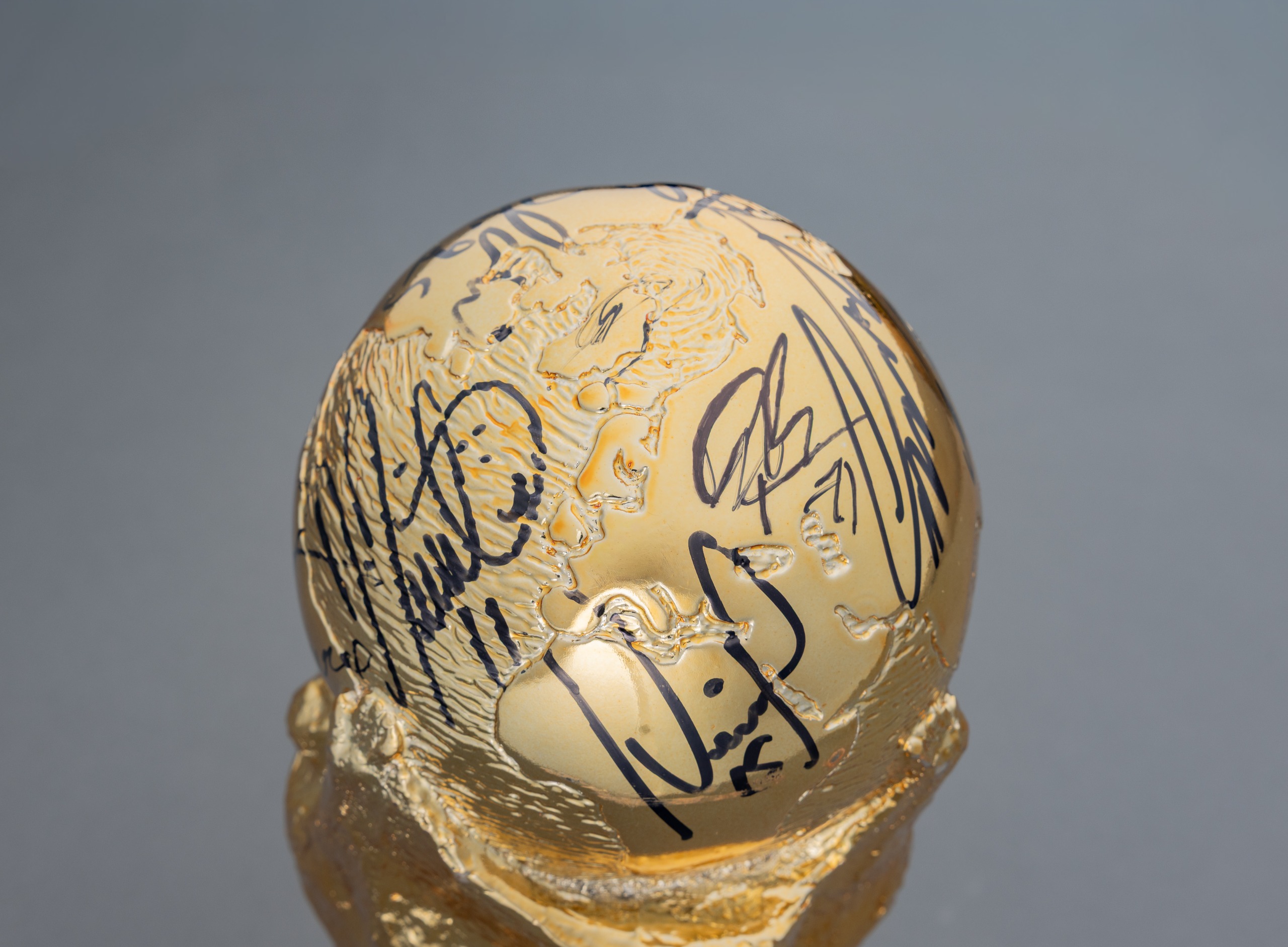 The replica World Cup trophy signed by Argentina players going up for auction