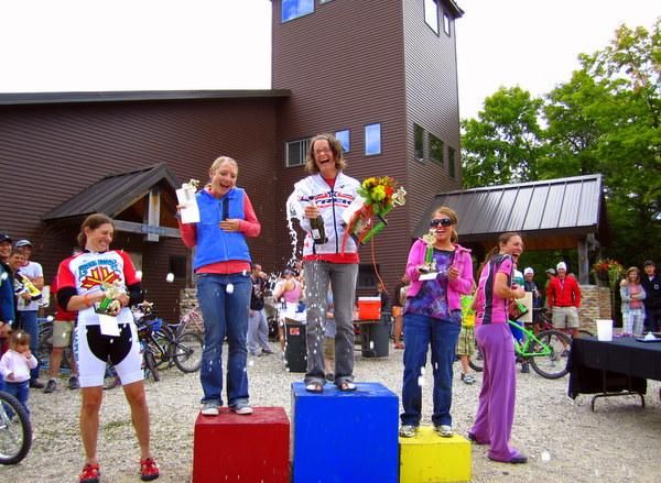 Elite women's podium having fun with the bubbly