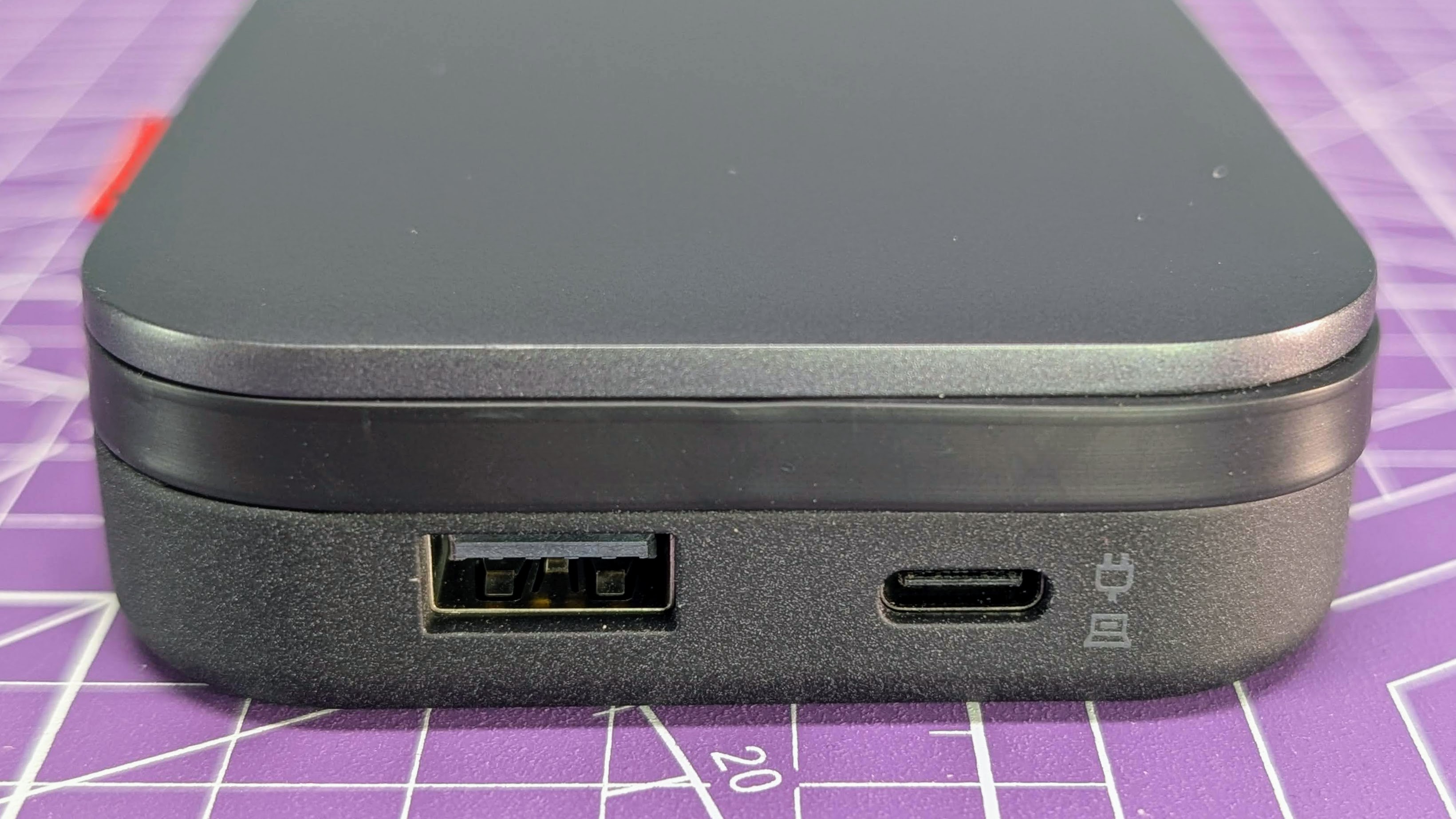 Lenovo Go USB-C laptop power bank viewed end on showing USB-A and USB-C ports