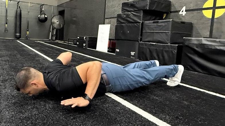 man doing exercise in the gym