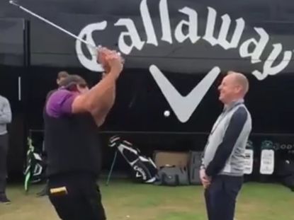 phil mickelson hits flop shot over man's head