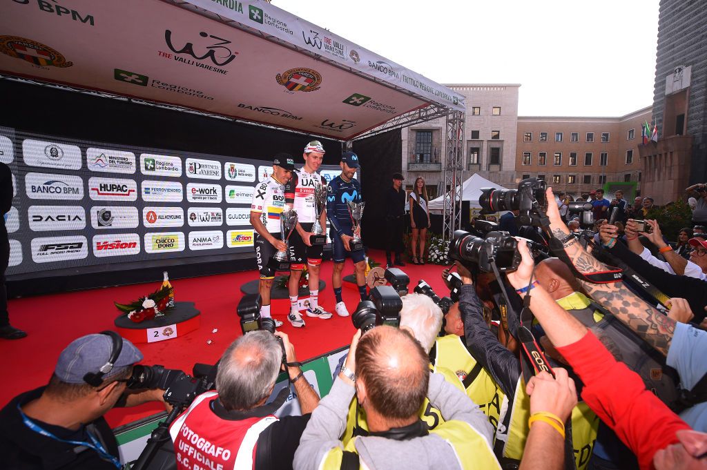 VARESE ITALY OCTOBER 04 LR Sergio Andres Higuita Garcia of Colombia and Bora Hansgrohe Team on second place race winner Tadej Pogacar of Slovenia and UAE Team Emirates and Alejandro Valverde Belmonte of Spain and Movistar Team on third place pose on the podium ceremony after the 101st Tre Valli Varesine 2022 a 1963km one day race from Busto Arsizio to Varese 377m TreValliVaresine on October 04 2022 in Varese Italy Photo by Dario BelingheriGetty Images