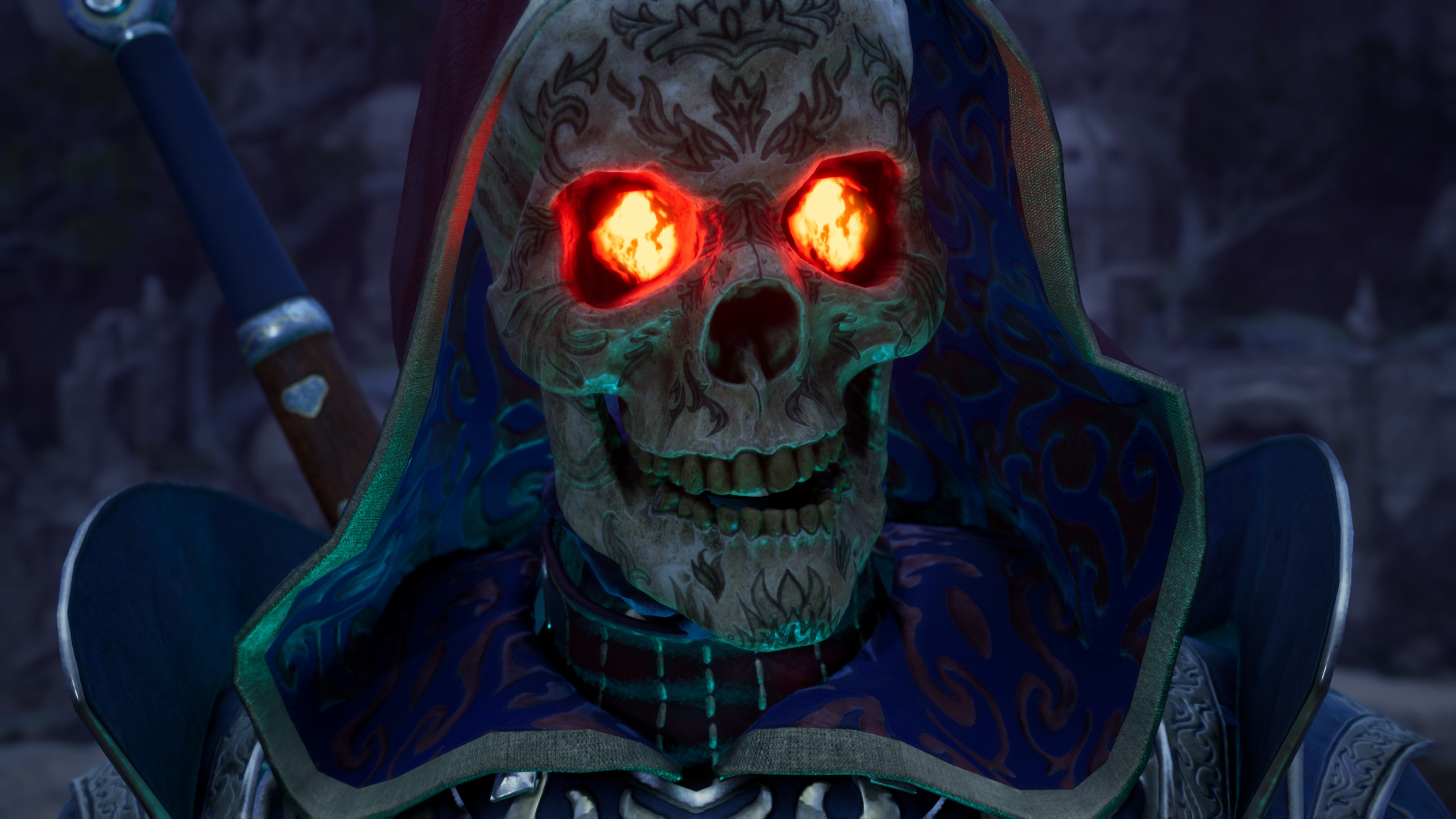 Skull with flaming eyes under hood with armor visible from shoulders down.