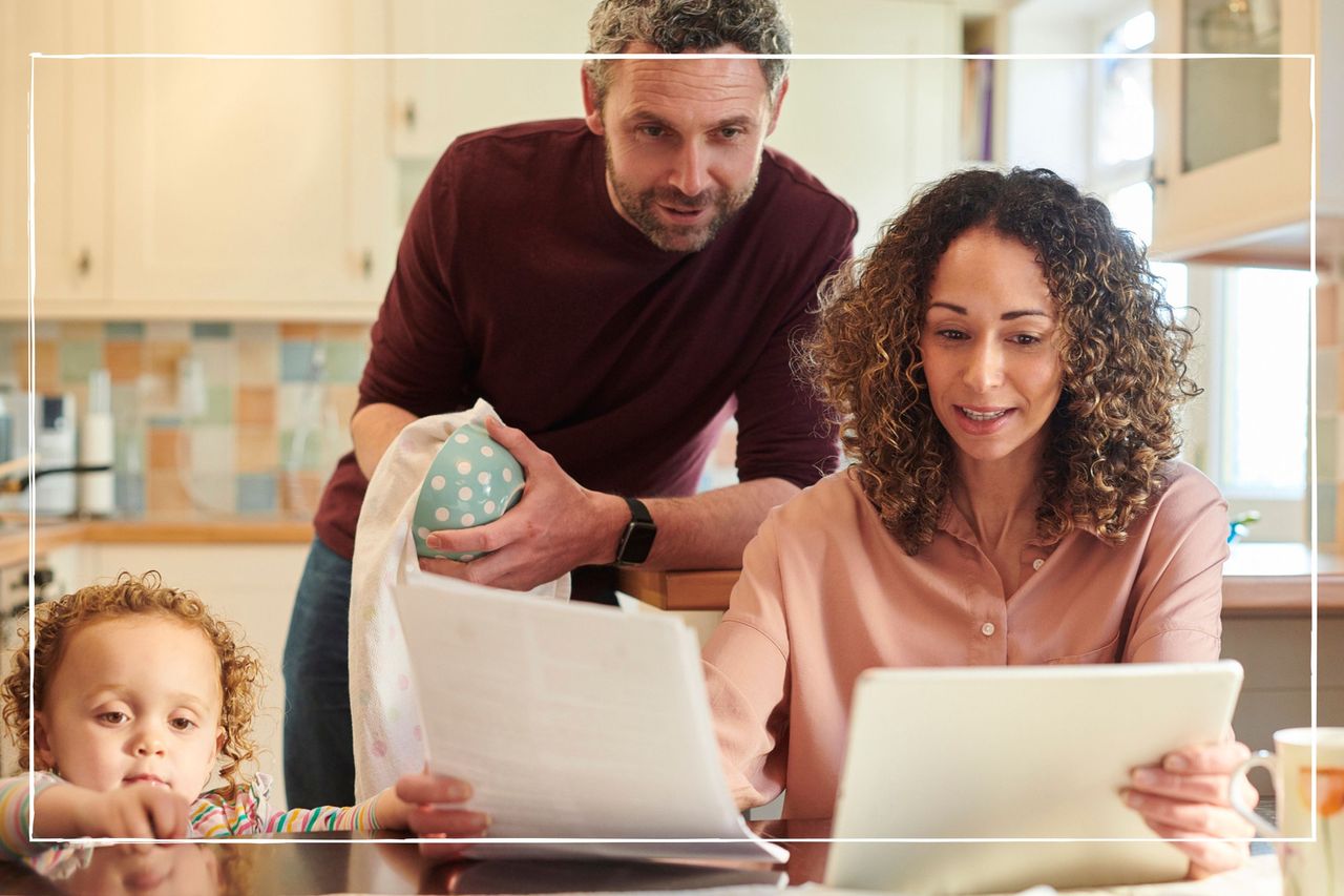 Family at table assessing bills