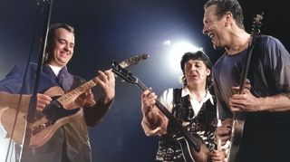 Robbie McIntosh, Paul McCartney, Hamish Stuart perform on stage during a Paul McCartney concert at Ahoy on October 9th 1993 in Rotterdam, Netherlands. 
