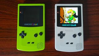 Game Boy Color with AMOLED screen with Zelda: Oracle of Season intro on screen next to green original