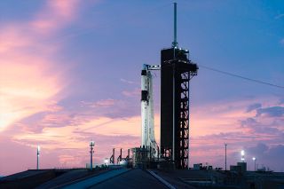 The SpaceX Falcon 9 rocket that will launch the Crew-1 astronauts aboard a Dragon capsule to the International Space Station stands poised on Pad 39A at Kennedy Space Center in Florida.