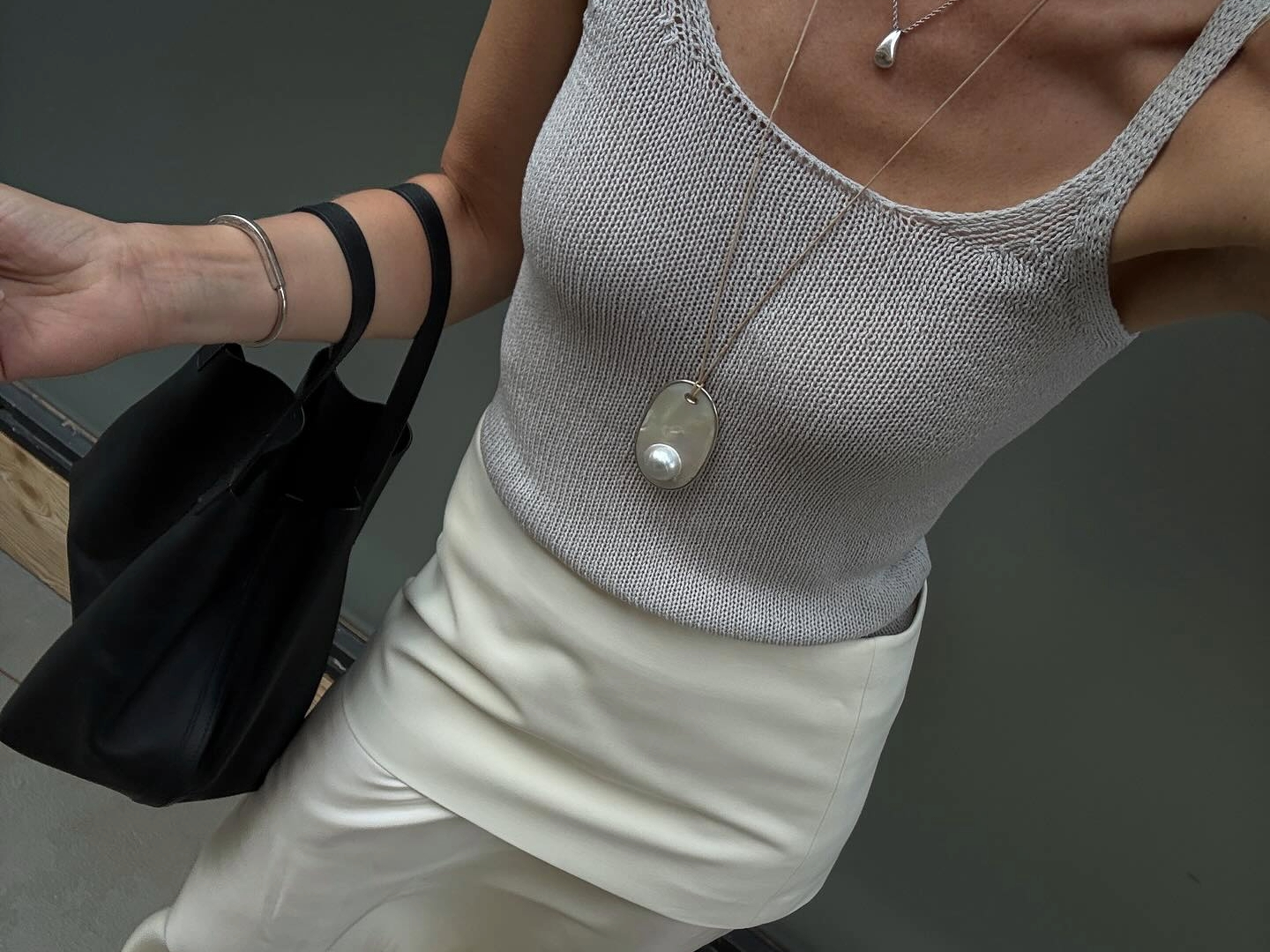 Anouk Yve in a white Rohe skirt.