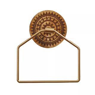 A brown towel ring with a circular patterned base