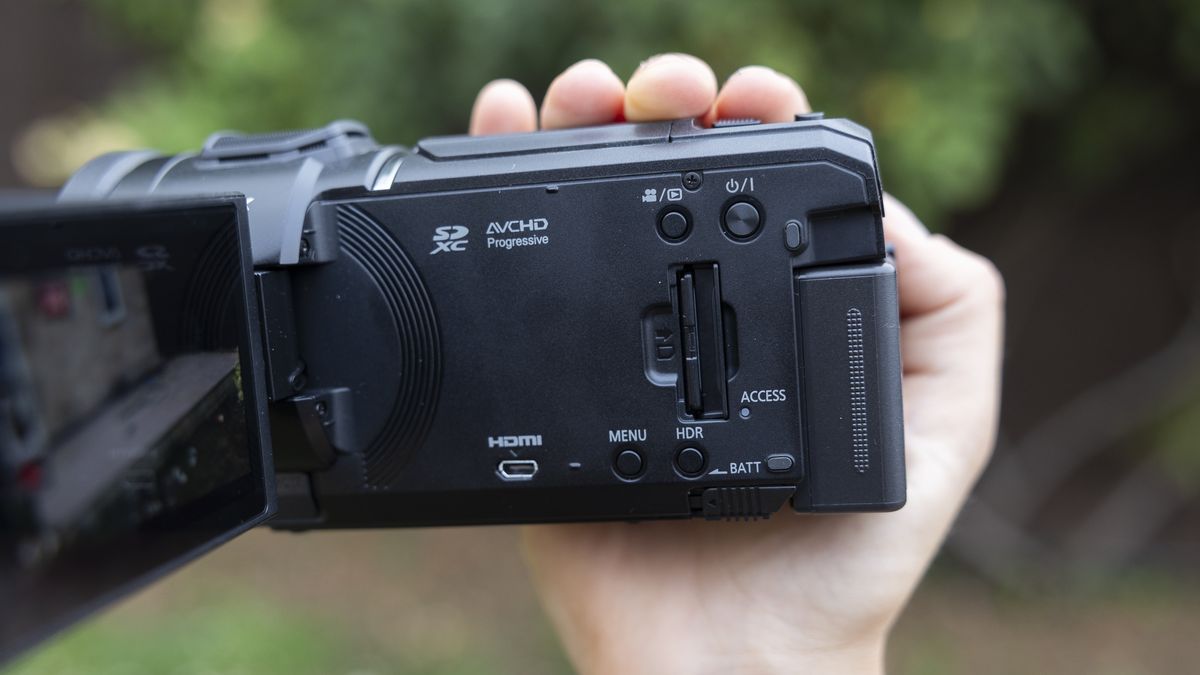 A side view of the Panasonic HC-V900 camcorder and ports