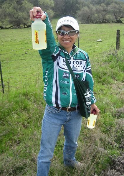 Merry, our soigneur, gets ready in the feed zone during Stage 1 of CVC.