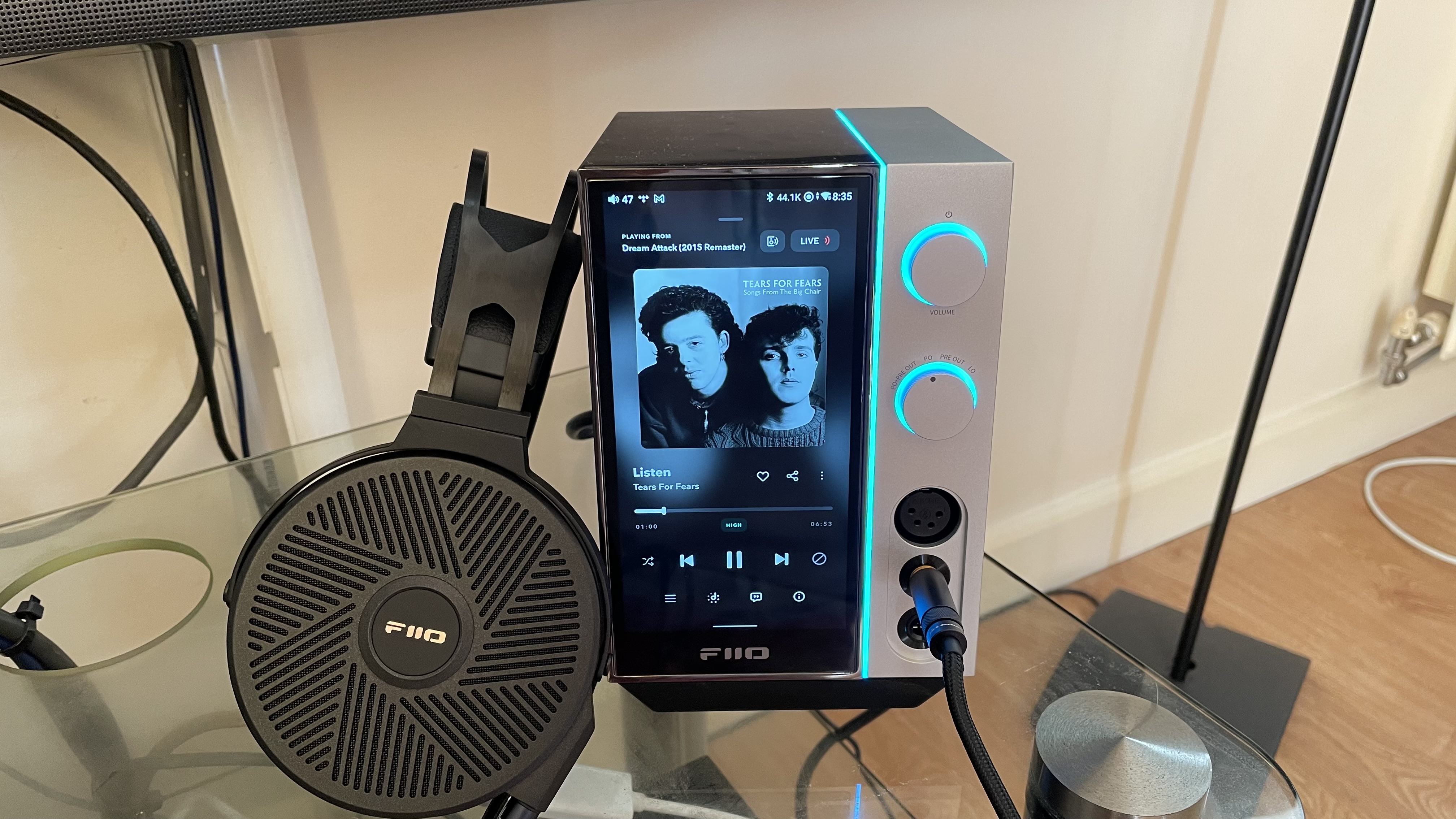 Fiio R9 and Fiio FT5 headphones on a hi-fi rack