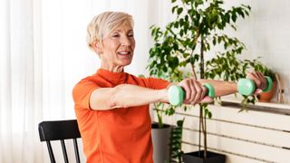 senior woman doing a chair workout