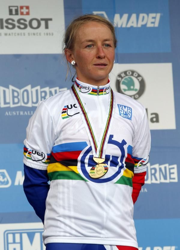 Emma Pooley (Great Britain) got a little teary on the podium as she became the first British woman to win a time trial title.