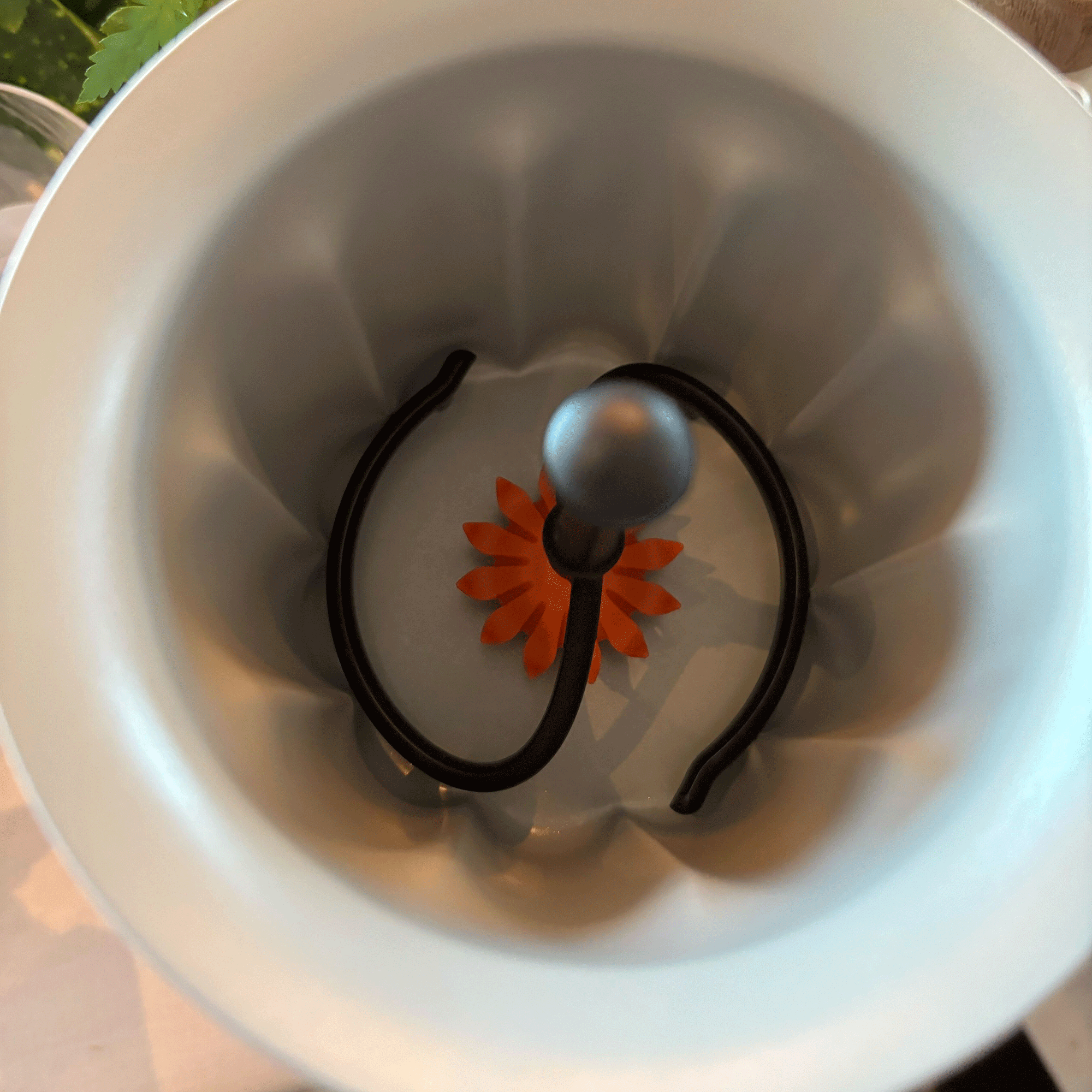 Inside the velvetiser with the orange flower whisk on show