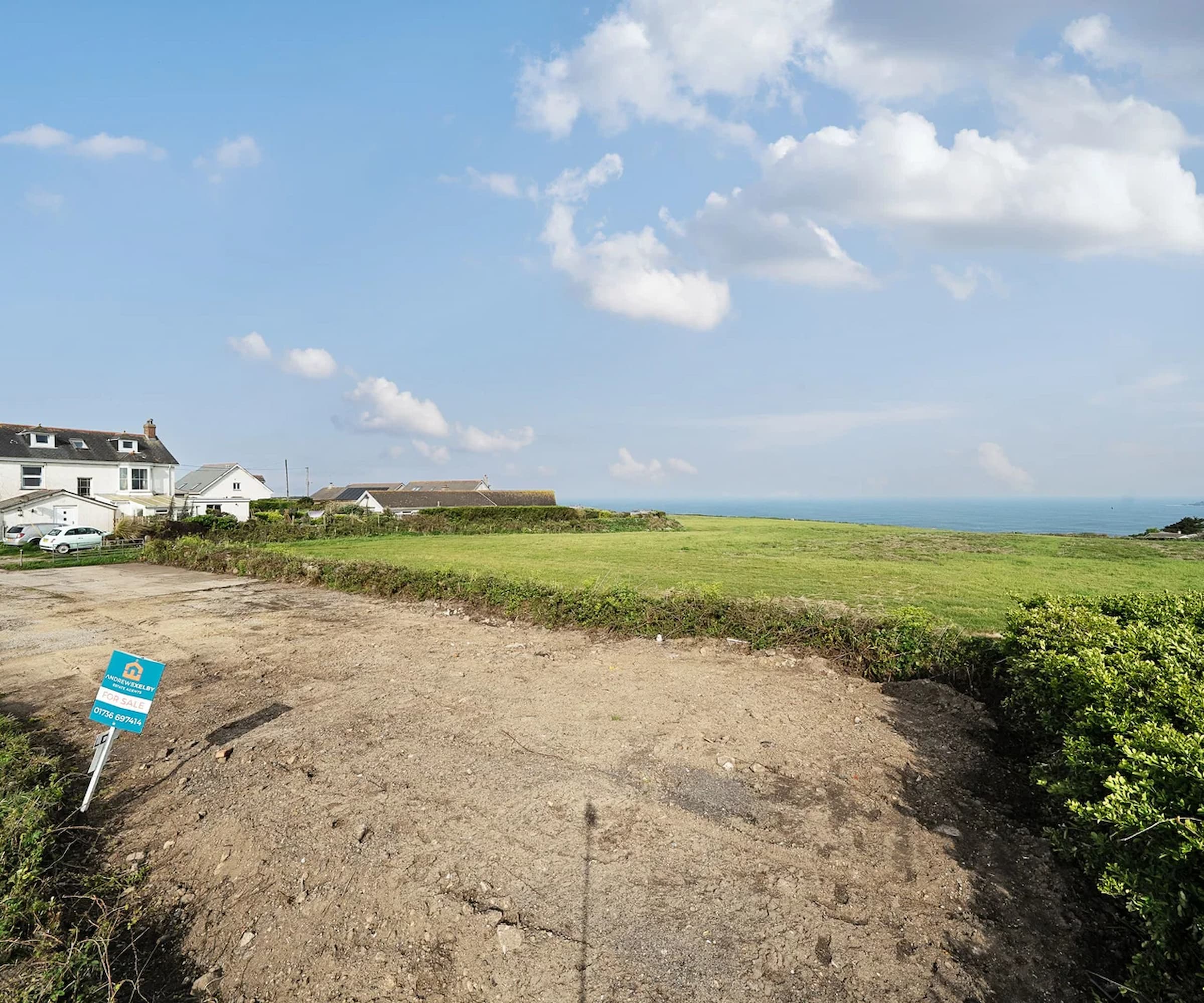 A car park on a plot in Cornwall overlooking the sea