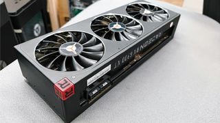 RX 6900 XT graphics card on a desk.