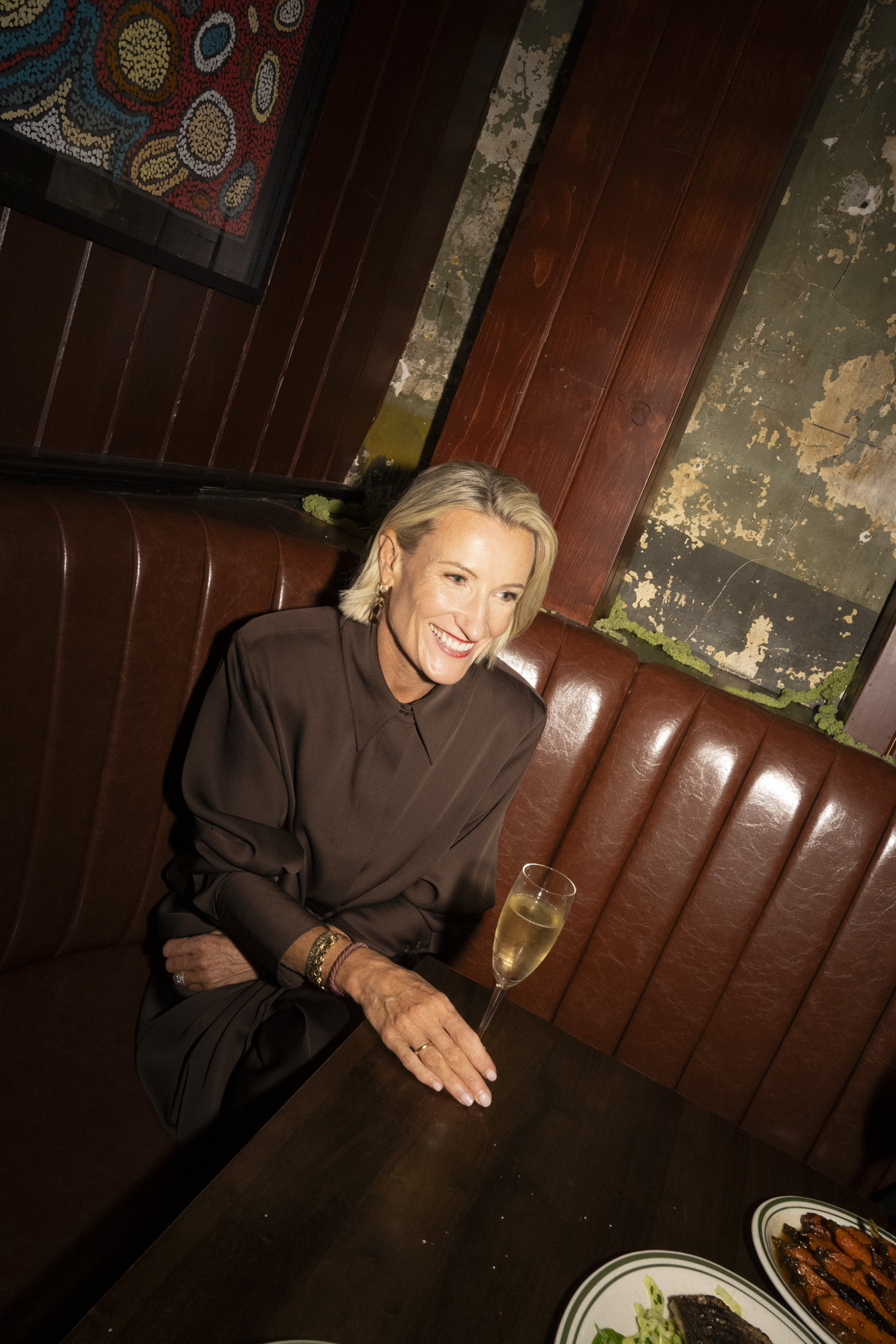 Anna Baird sitting in a restaurant.