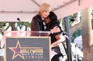 Allison Janney and Octavia Spencer hugging