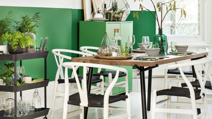 Table with chairs and white wall