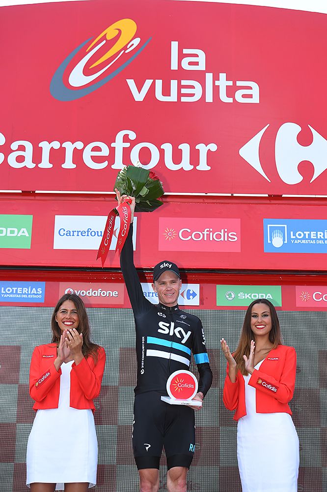 Chris Froome (Team Sky) tops the stage 11 podium