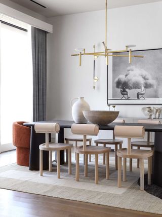 a modern dining room with a bowl on the table