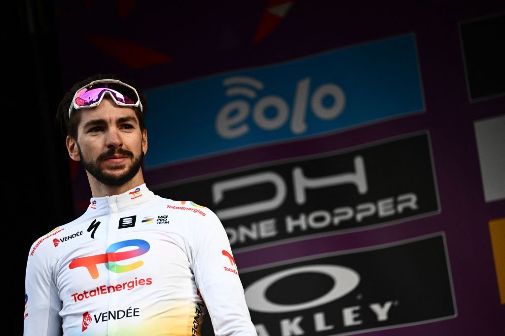 Secondplaced Team Total Direct Energies Anthony Turgis of France stands on the podium after the 113th MilanSan Remo oneday classic cycling race on March 19 2022 between Milan and San Remo northern Italy Photo by Marco BERTORELLO AFP Photo by MARCO BERTORELLOAFP via Getty Images