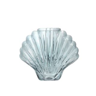 A seashell shaped glass vase
