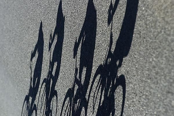 Shadow racing: The lead group of four riders were closing in on the finish at Wentworth.