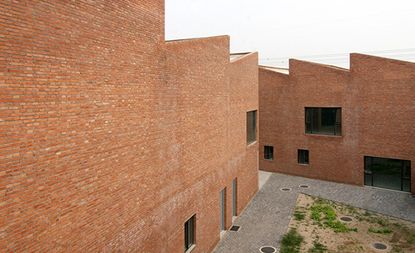 Its portfolio includes twin studio houses for two artists in Songzhuang (pictured) and a courthouse building in St Pölten